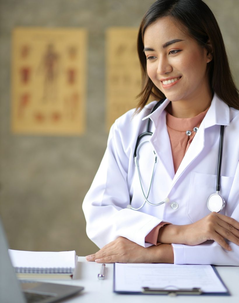 Female doctor working in the doctor's office at the hospital.